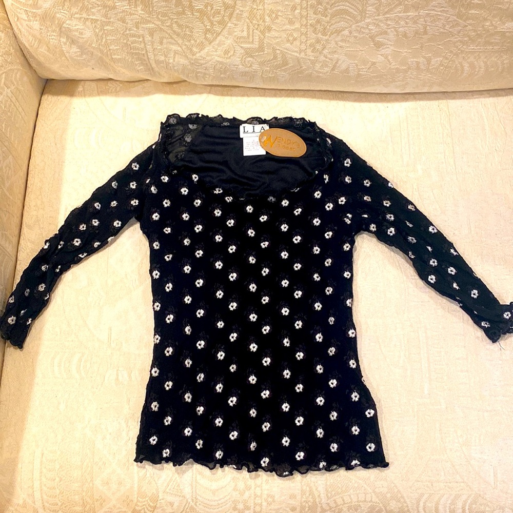 NWT. Lia Sheer 3/4 sleeves.  Body is lined